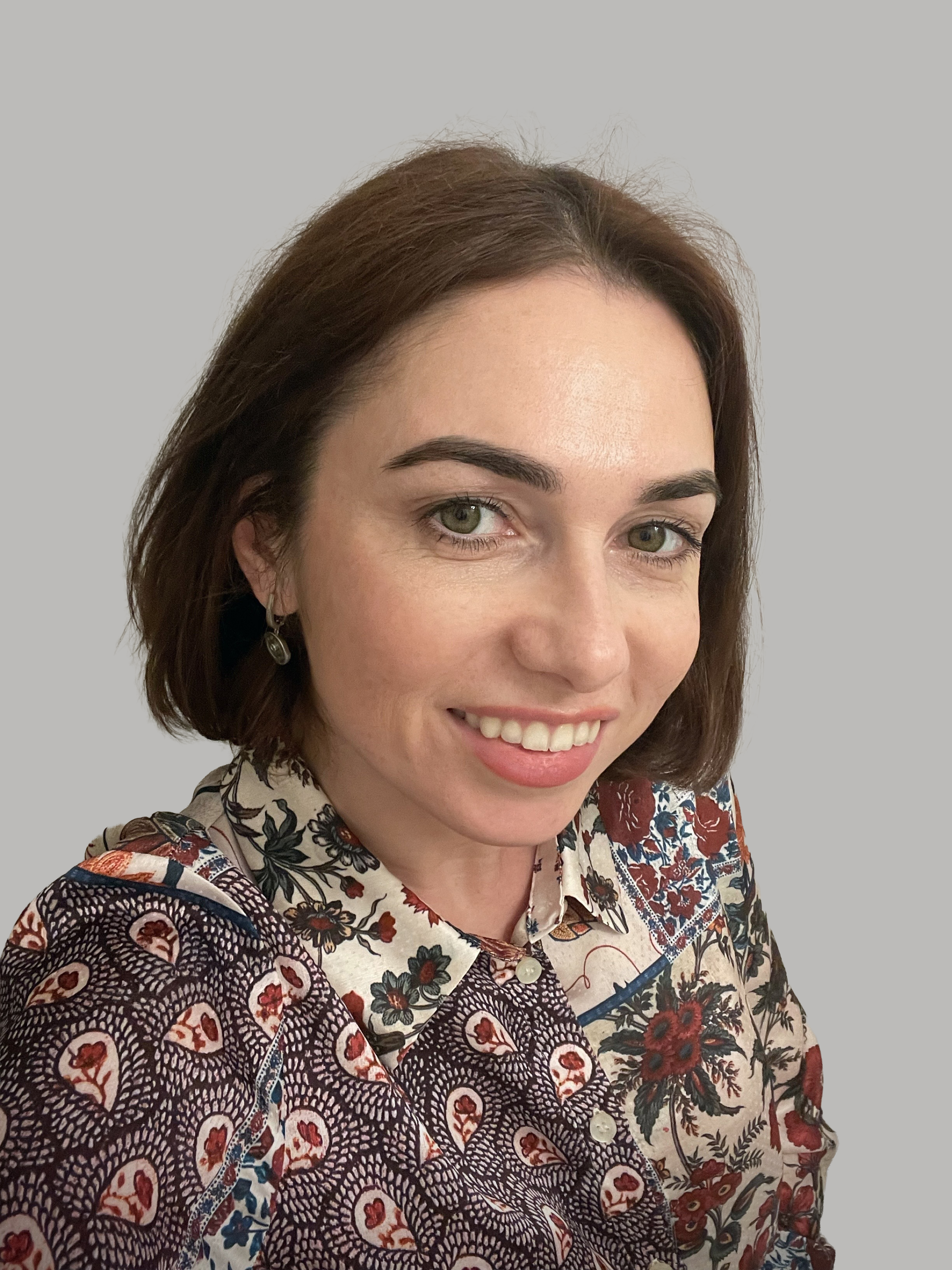 Olga Ermolaeva, Lead Legal Officer at Mellow seen posing for a photo with a smile on her face